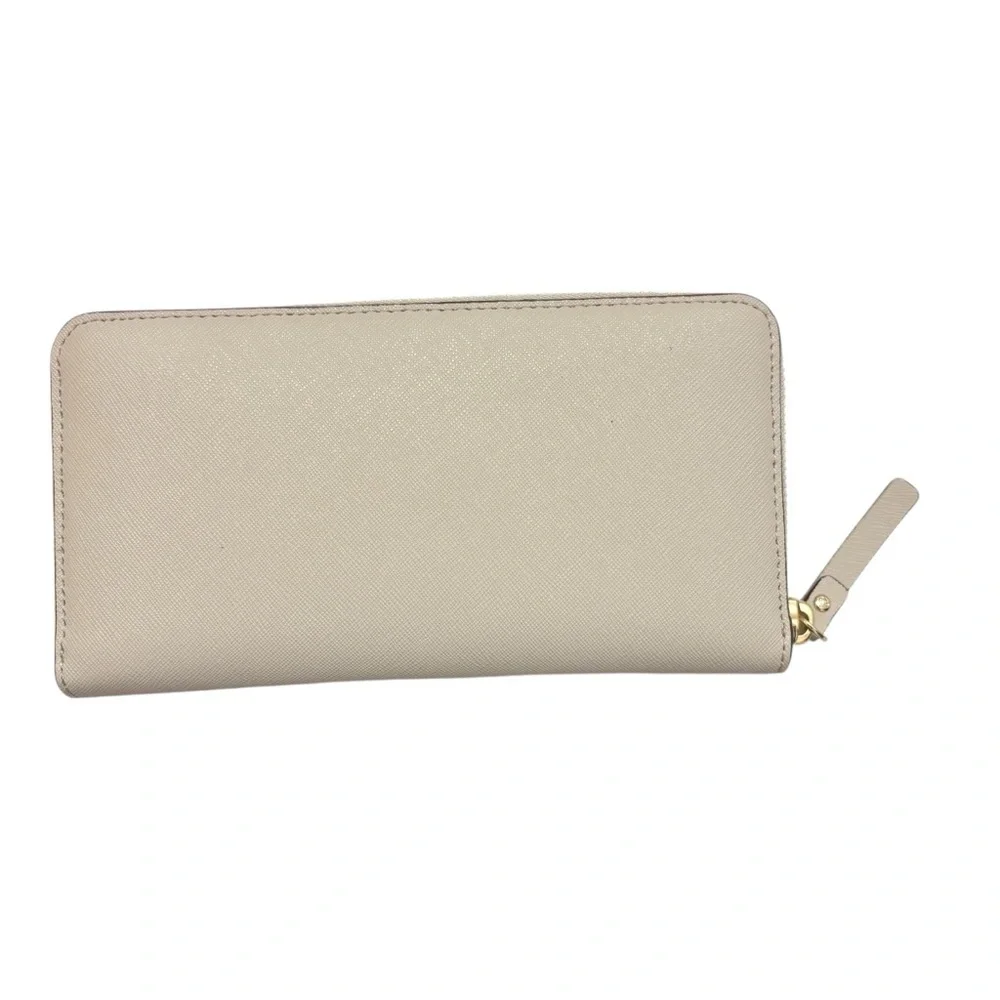 Kate spade cream and black saffiano leather bow wallet color block